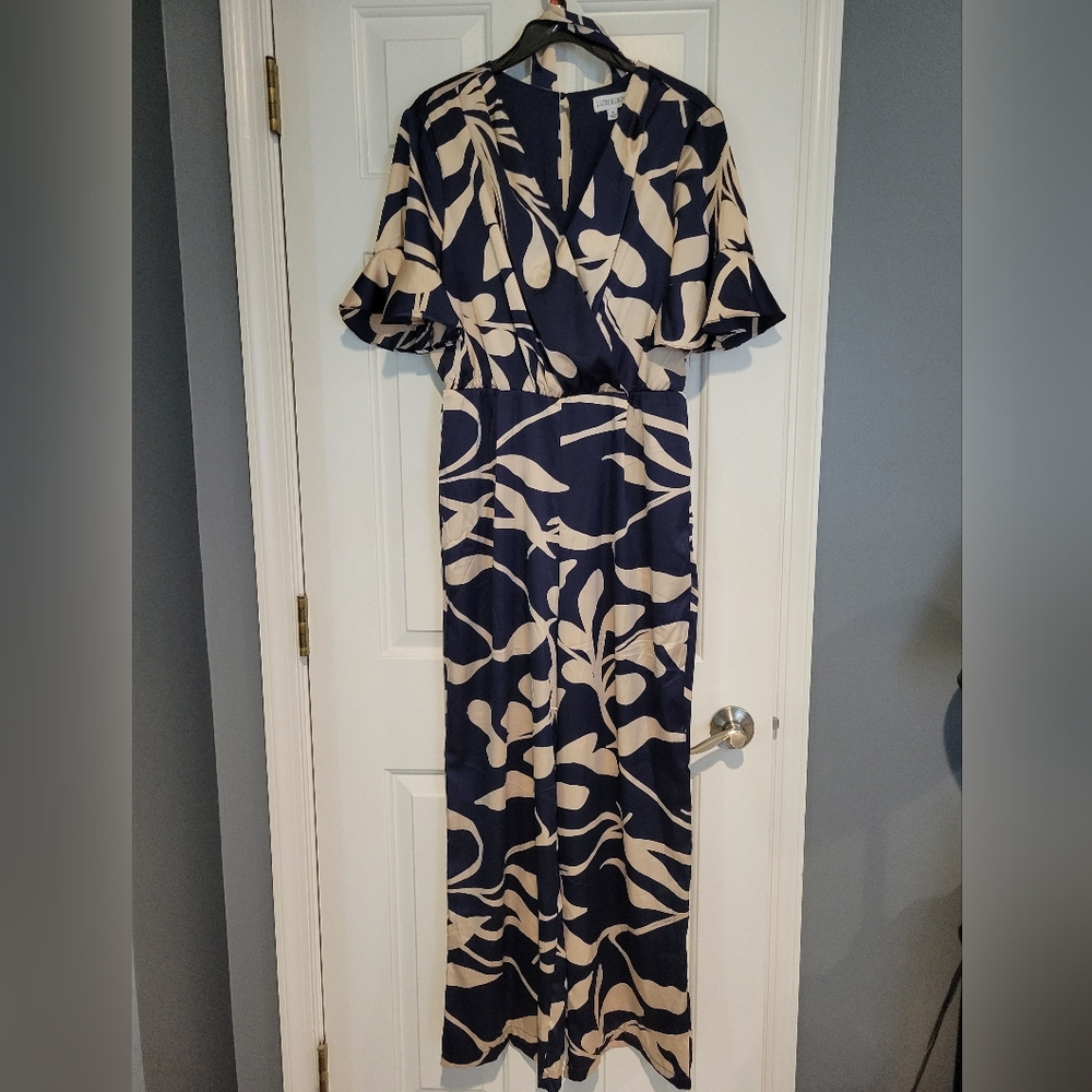 Luxology Navy and Beige Floral Jumpsuit. Silky Feel. Has Matching Belt.